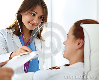 female-medicine-doctor-communicating-examining-listening-stethoscope-patient-war.jpg