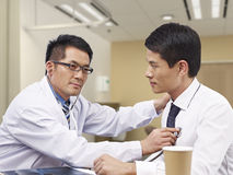 asian-doctor-patient-checking-stethoscope-48164684.jpg