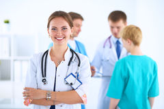 attractive-female-doctor-front-medical-group-62226840.jpg