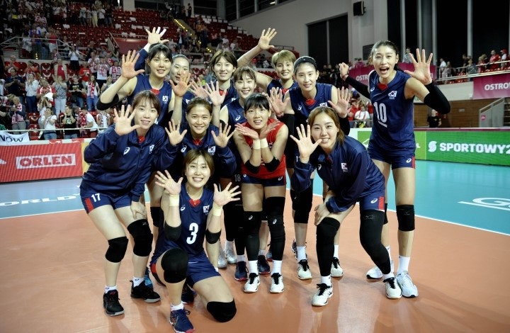TeamKoreashowtheirhappinessafterwinningamatch.jpg