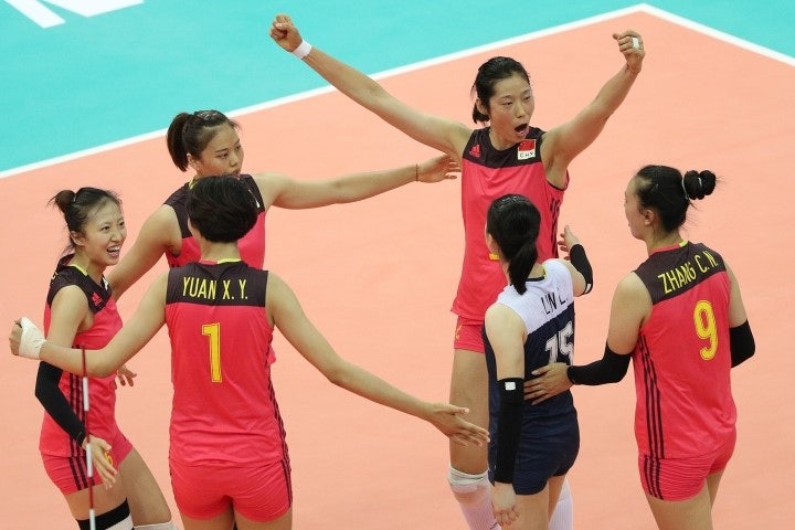 PlayersofChinacelebrateapointduringthematchbetweenChinaandBrazilduringDay1of.jpg